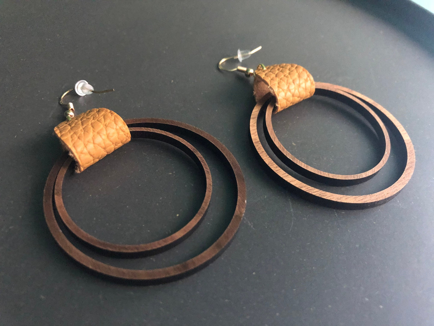 Double Wooden Hoop Earrings. Leather Hoop Earrings. Hoop earrings with leather tag.